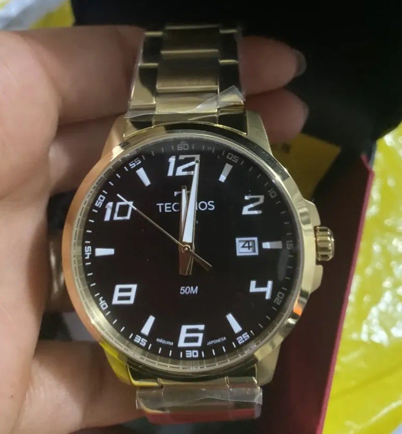 Relógio Technos Racer Masculino Dourado 50m Aço Inoxidável Fundo Preto