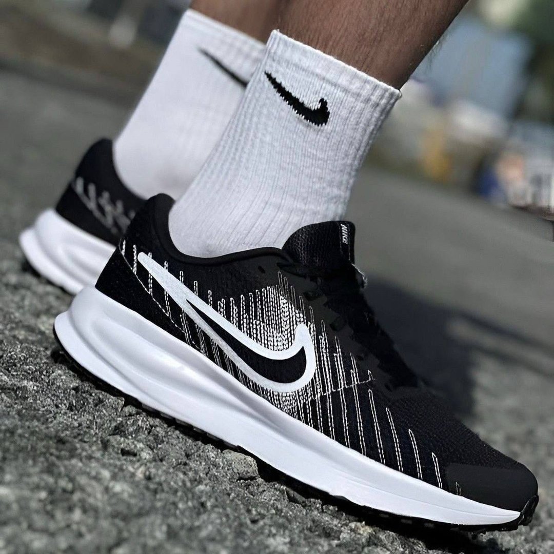 Tênis Nike Run Defy