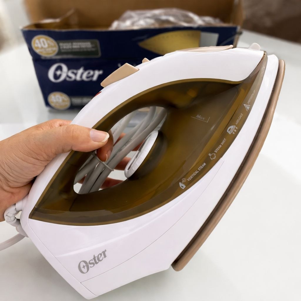 Ferro de Passar a Vapor Oster Antiaderente, 110V, Champagne/Branco, 1200W, GCSTBS5907
