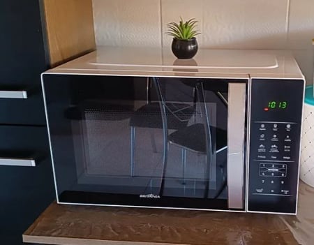 Micro-ondas Bmo28 Porta Espelhada 25l 1100w Britânia